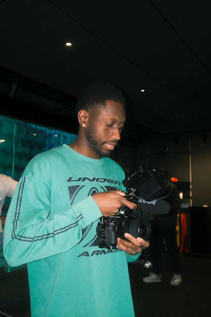 Mandel, reviewing footage.